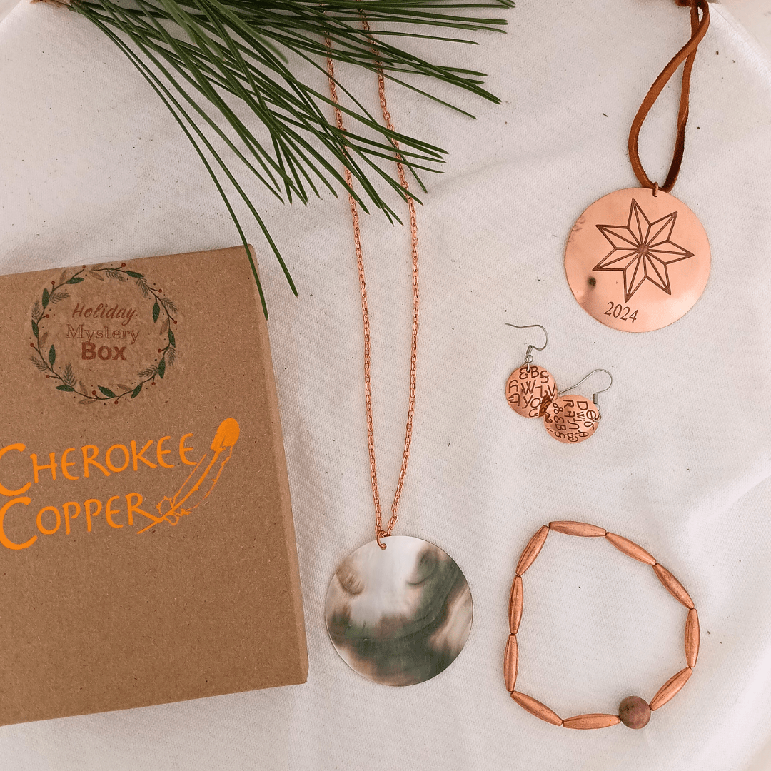 Cherokee Copper Holiday Mystery Box with copper jewelry and ornament.
