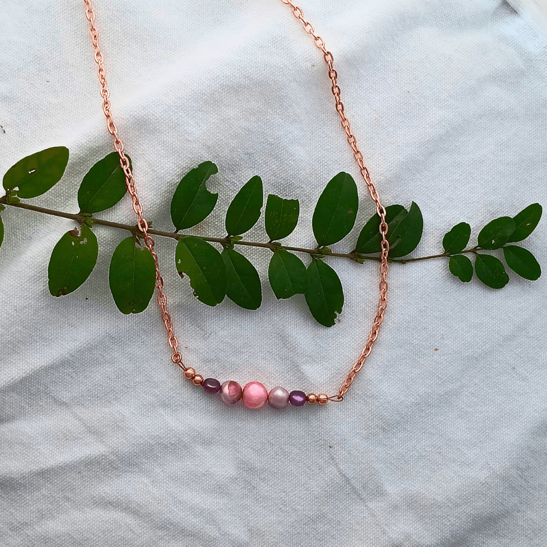 Rose gold beaded necklace with pink and purple beads