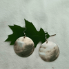 Black lip shell earrings with copper accents on leaf