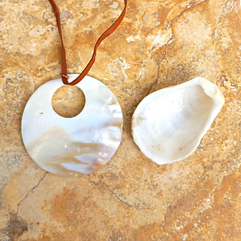 Ancient Waters Mother of Pearl Pendant Necklace on Deerhide