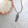 Black Lip Shell Feather Pendant Necklace on Deerhide