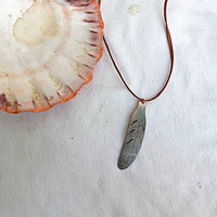 Black Lip Shell Feather Pendant Necklace on Deerhide