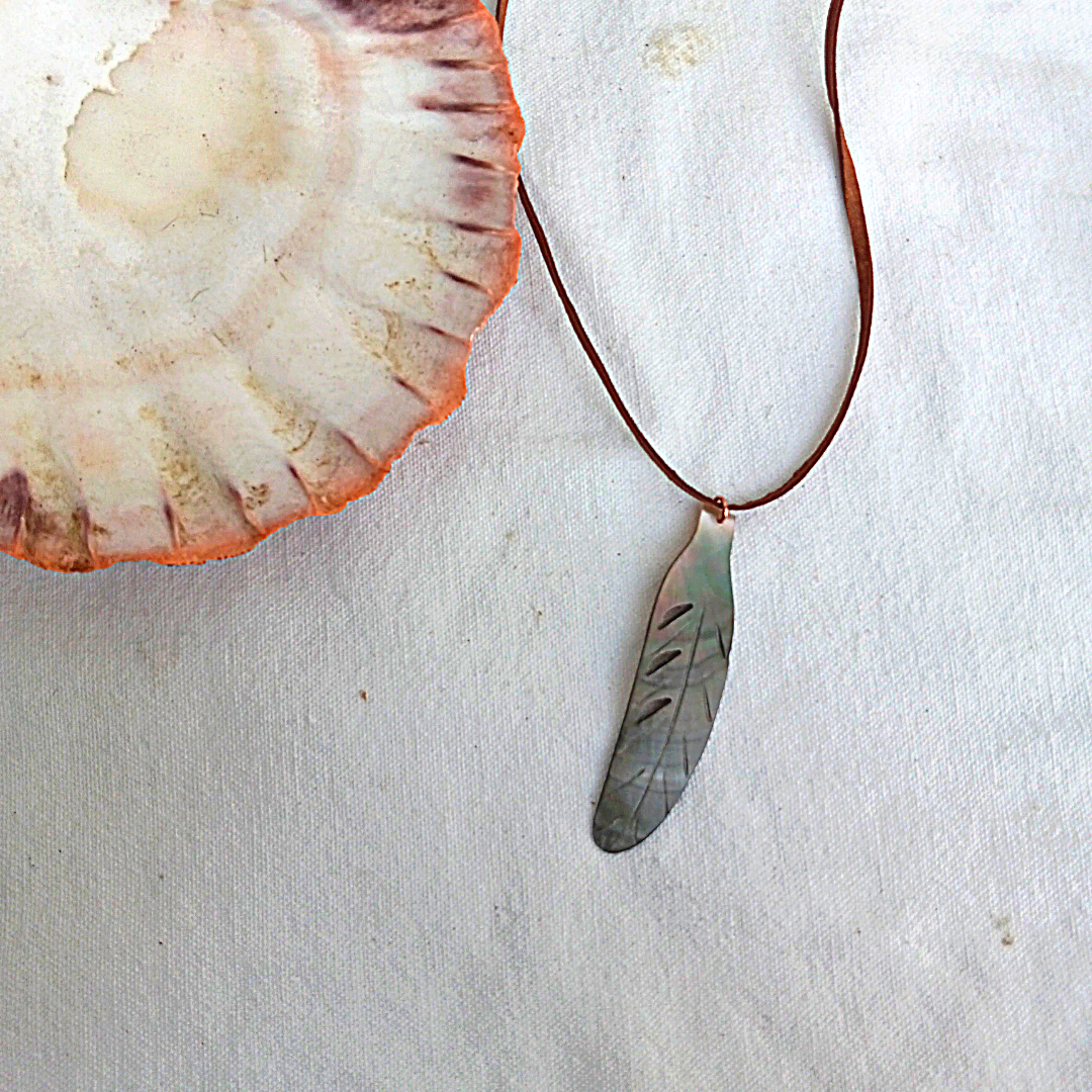 Black Lip Shell Feather Pendant Necklace on Deerhide