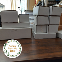 Holiday Mystery Box with stacked white boxes
